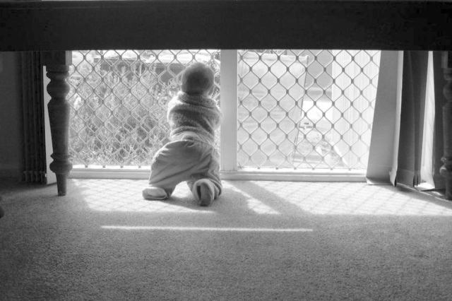 Child at window