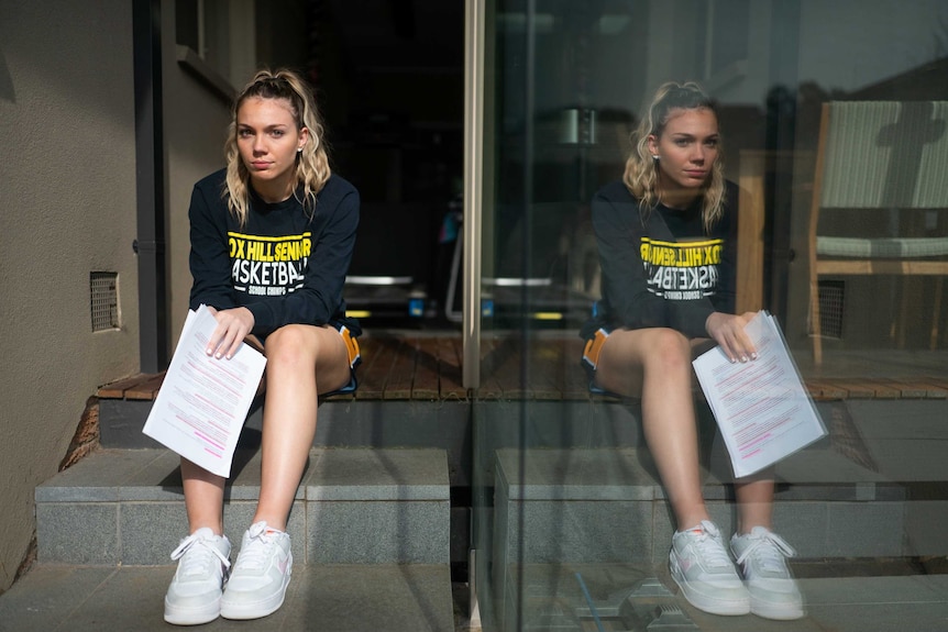 Year 12 student Zoe Jenkins sitting on her steps.