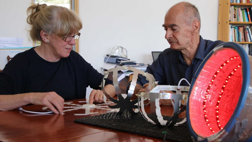 Dr Catherine Hamilton and Ron Brown designing the helmet