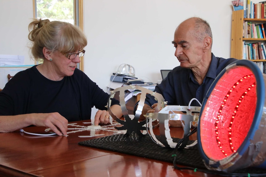 Dr Catherine Hamilton and Ron Brown designing the helmet