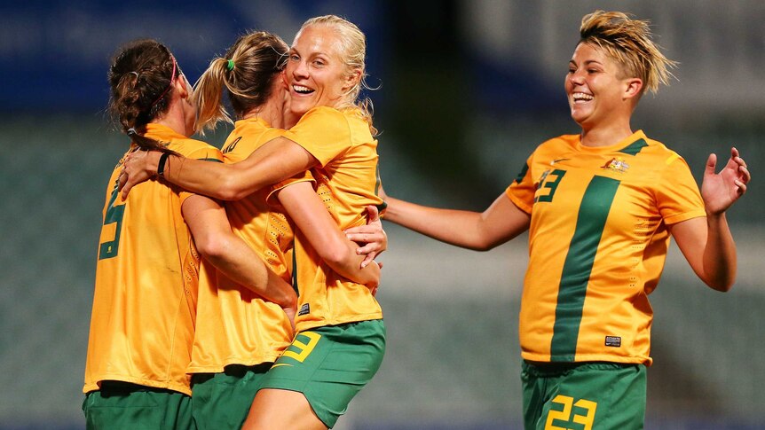 Matildas celebrate Emily Van Egmond's goal against China