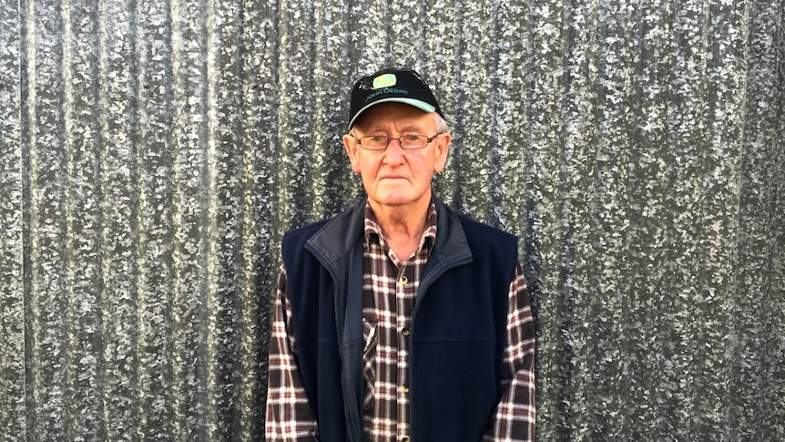 Cattle farmer Frank Hollis standing by his old sheering shed in Heywood, south-west Victoria