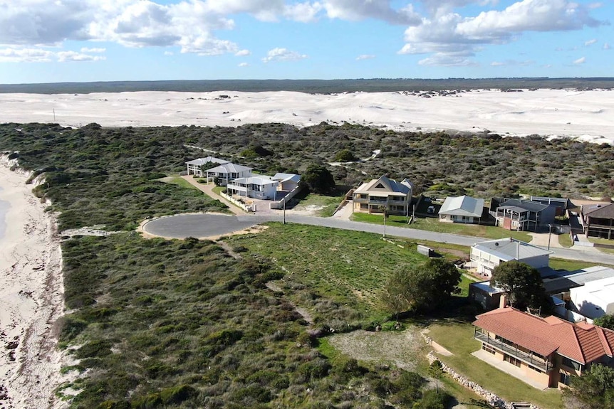 An aerial shot of north Lancelin showing the beach closing in on homes.