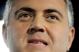 Joe Hockey says the mining tax is partly to blame for the dollar's woes.