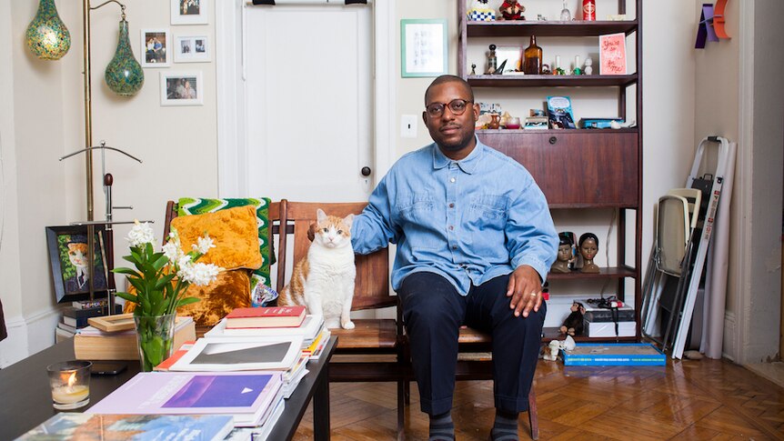 A portrait of man with his cat shot by Brooklyn-based photographer David Williams.
