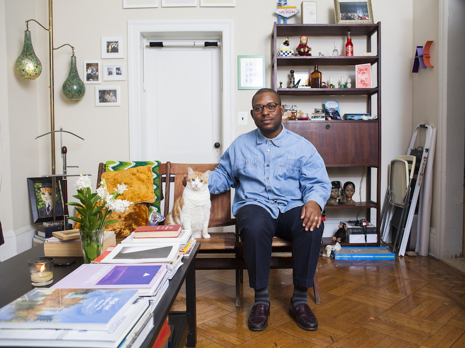 A portrait of man with his cat shot by Brooklyn-based photographer David Williams.