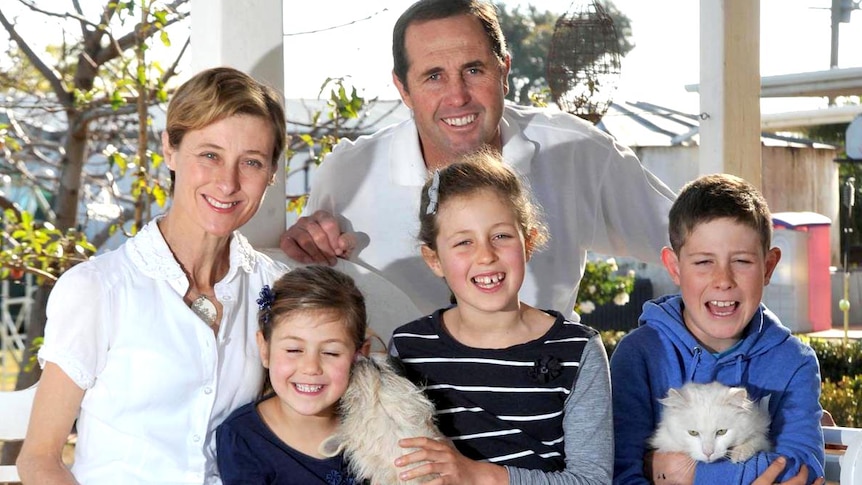 Kim Hunt with her husband Geoff and their children.