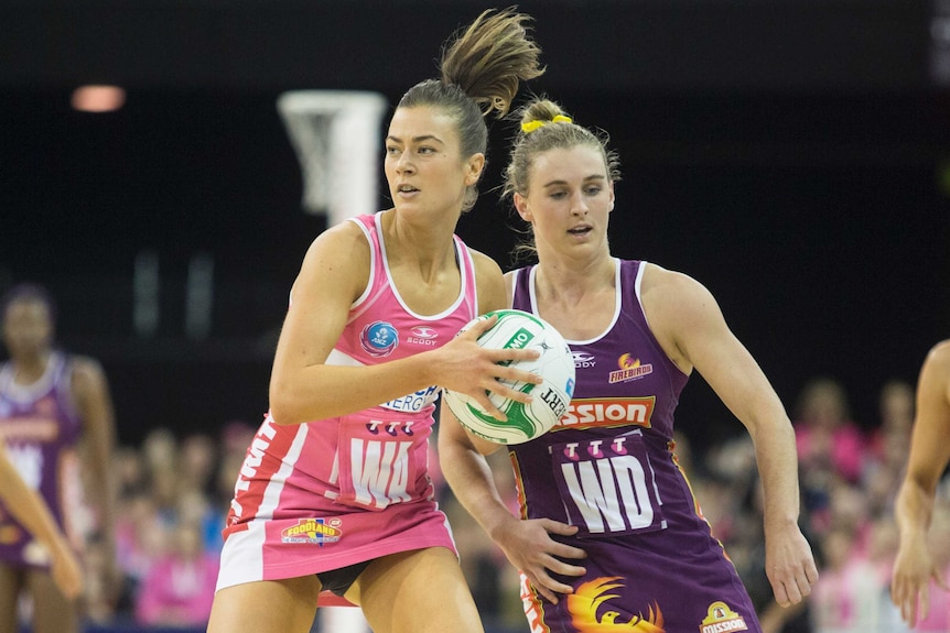Emily Beaton of the Adelaide Thunderbirds looks to pass during trans-Tasman netball championship final.