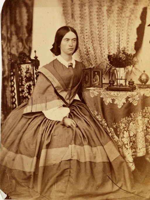 Mary Dixon Cooke, c1860, photographed with a photograph of her father Thomas Dixon beside her.