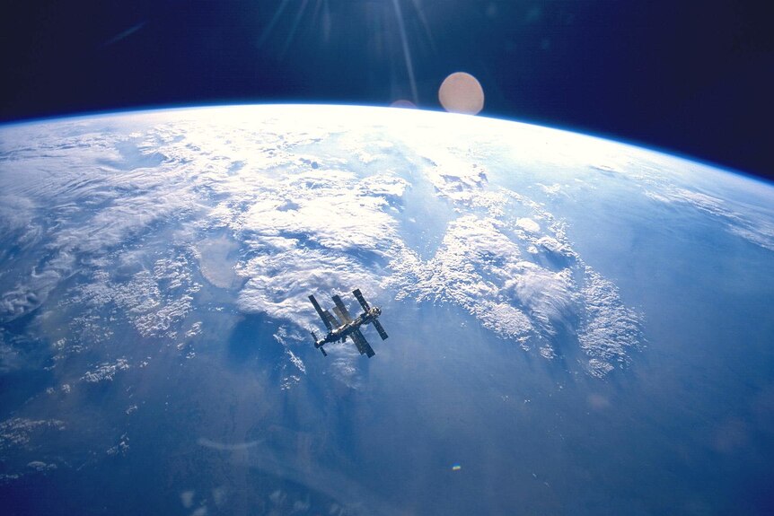 Mir Space Station with Earth in the background.