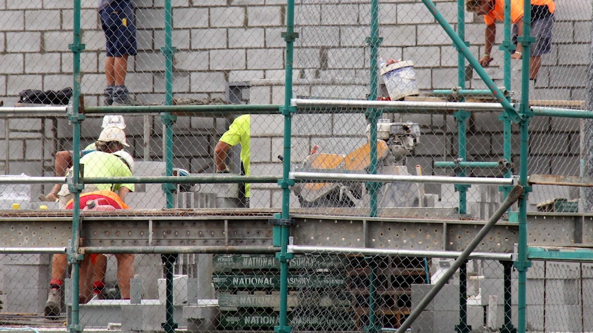 Workers on a residential building site.