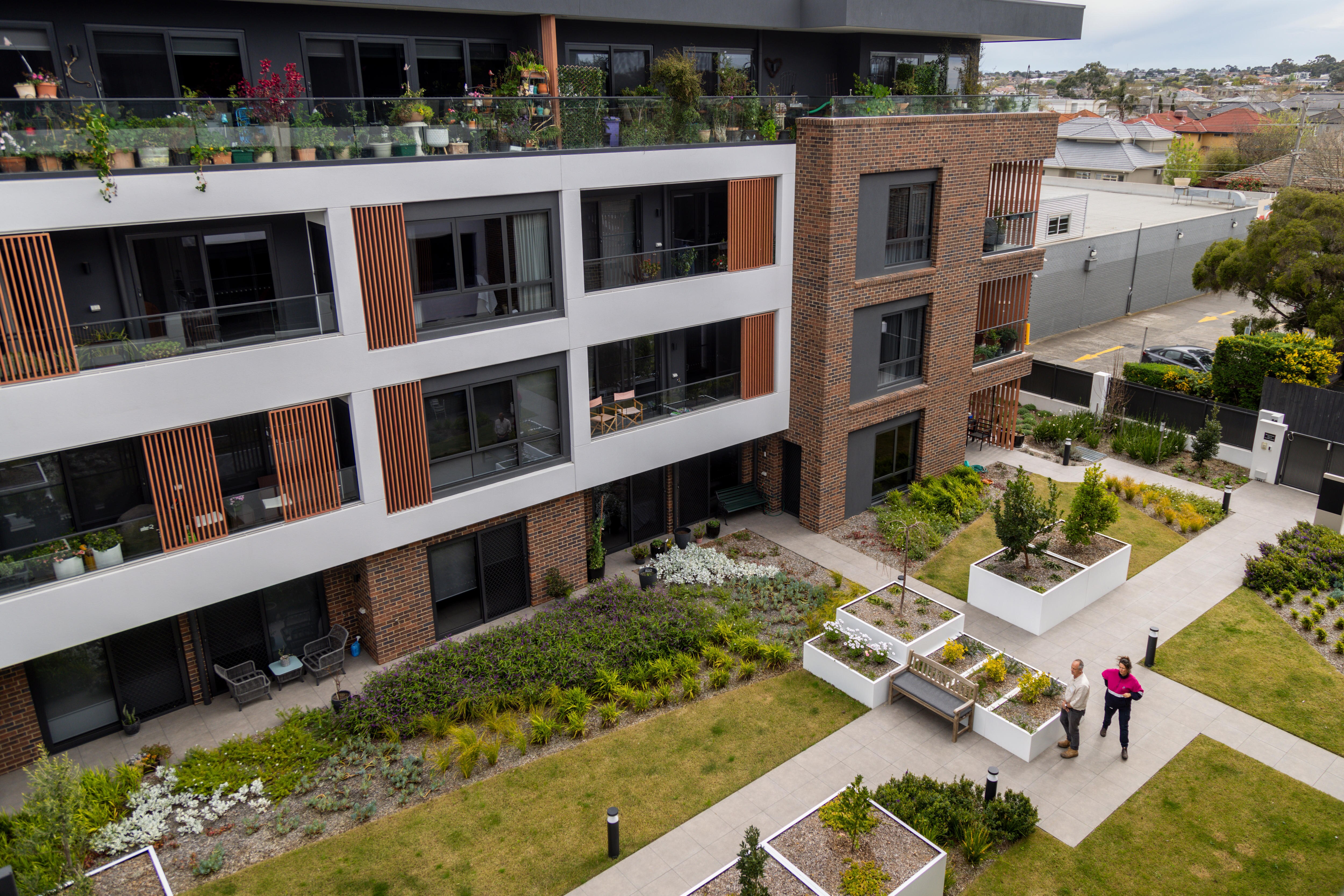 A bird's eye view of a garden attached to a retirement village.