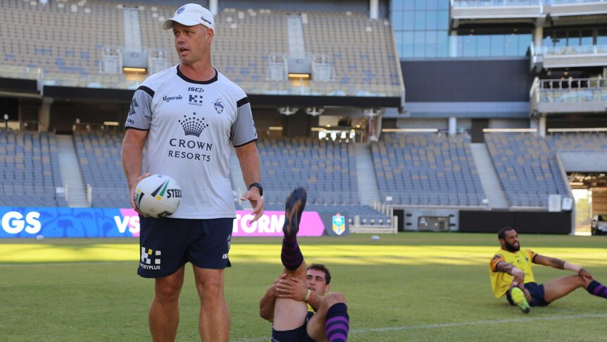 Lachlan Penfold (L), director of performance at Melbourne Storm, at training.