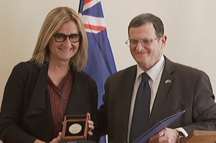 Judy Kaye receives the Righteous Among the Nations award for her grandmother Jolan Michnay at the Israeli Embassy in Canberra.