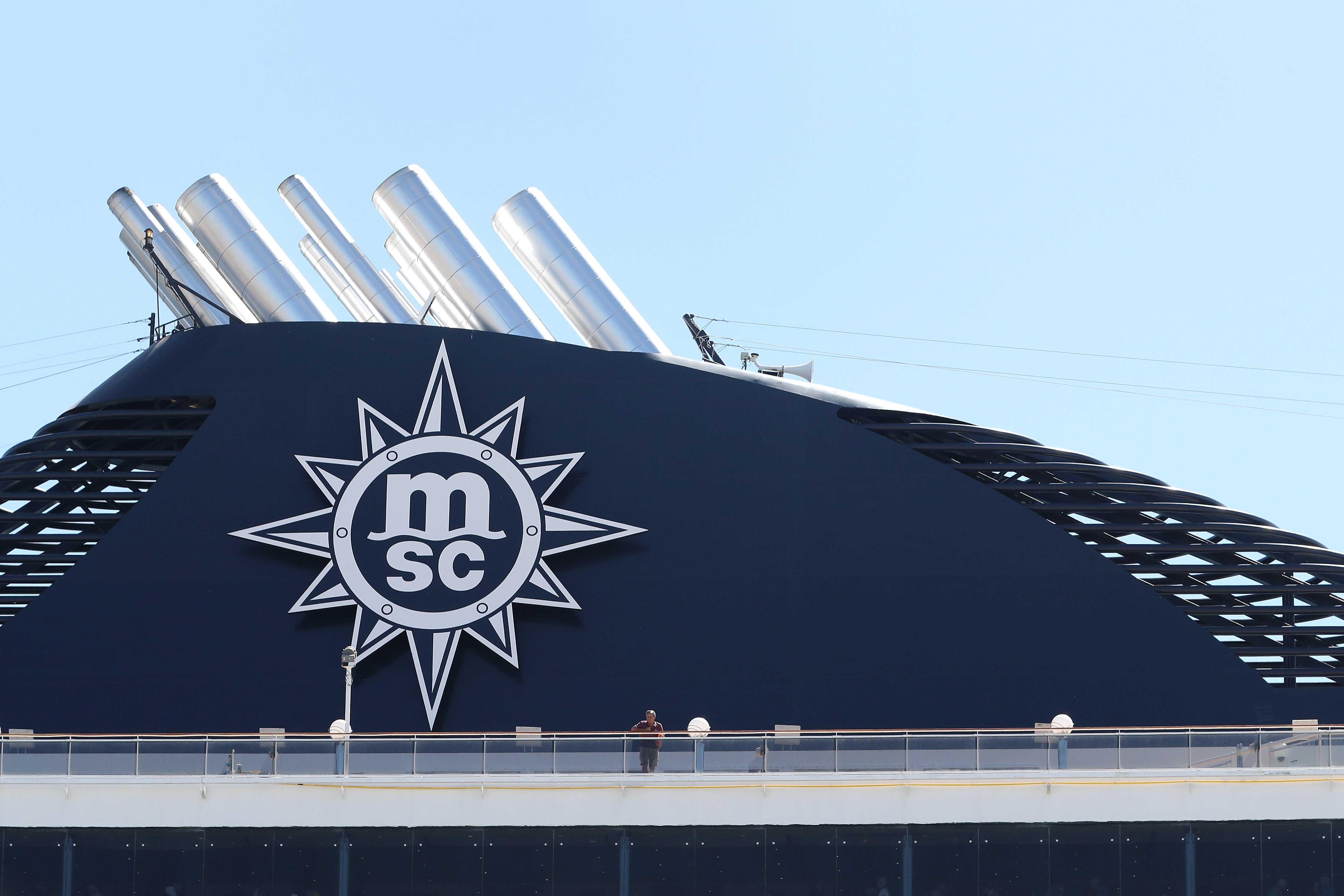 a passenger on the tip deck of a MSC cruise ship. 