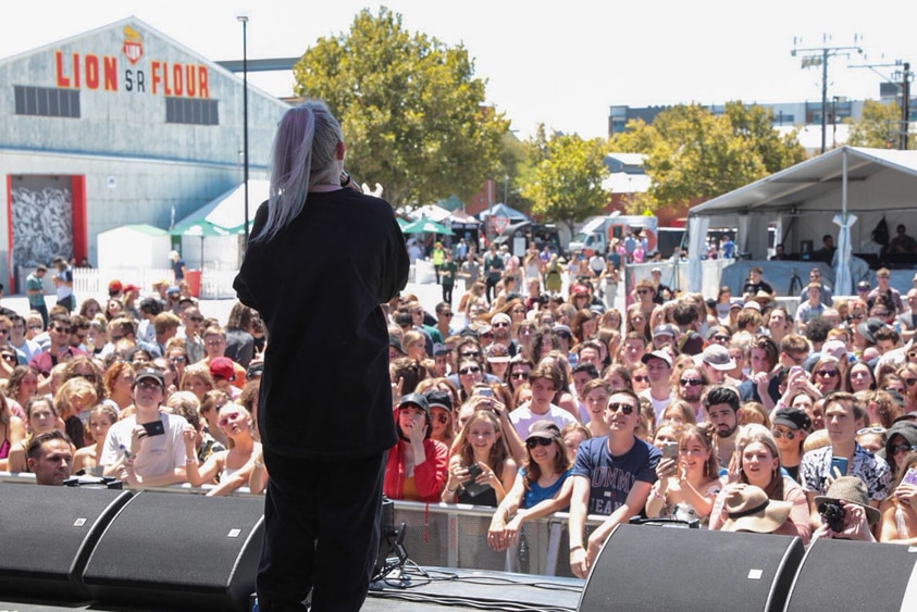 Billie Eilish looking out over the crowd at Laneway Festival in Port Adelaide 2018