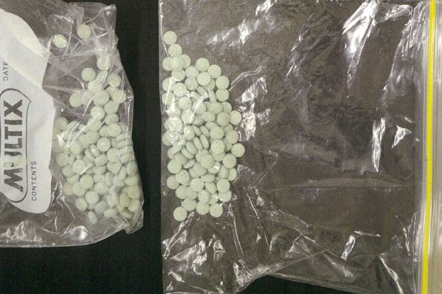 Illicit drugs in pill form in two snap-lock bags seized by Perth police.