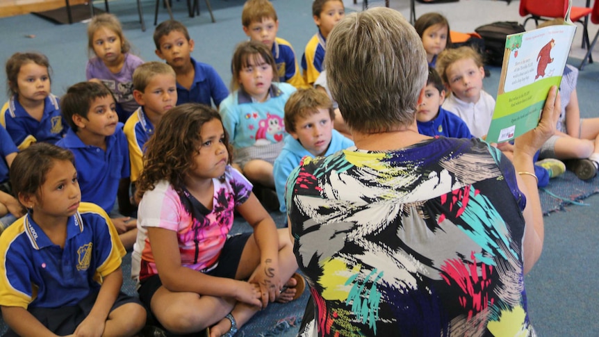 Students are read a story by their teacher at Coonamble Primary School
