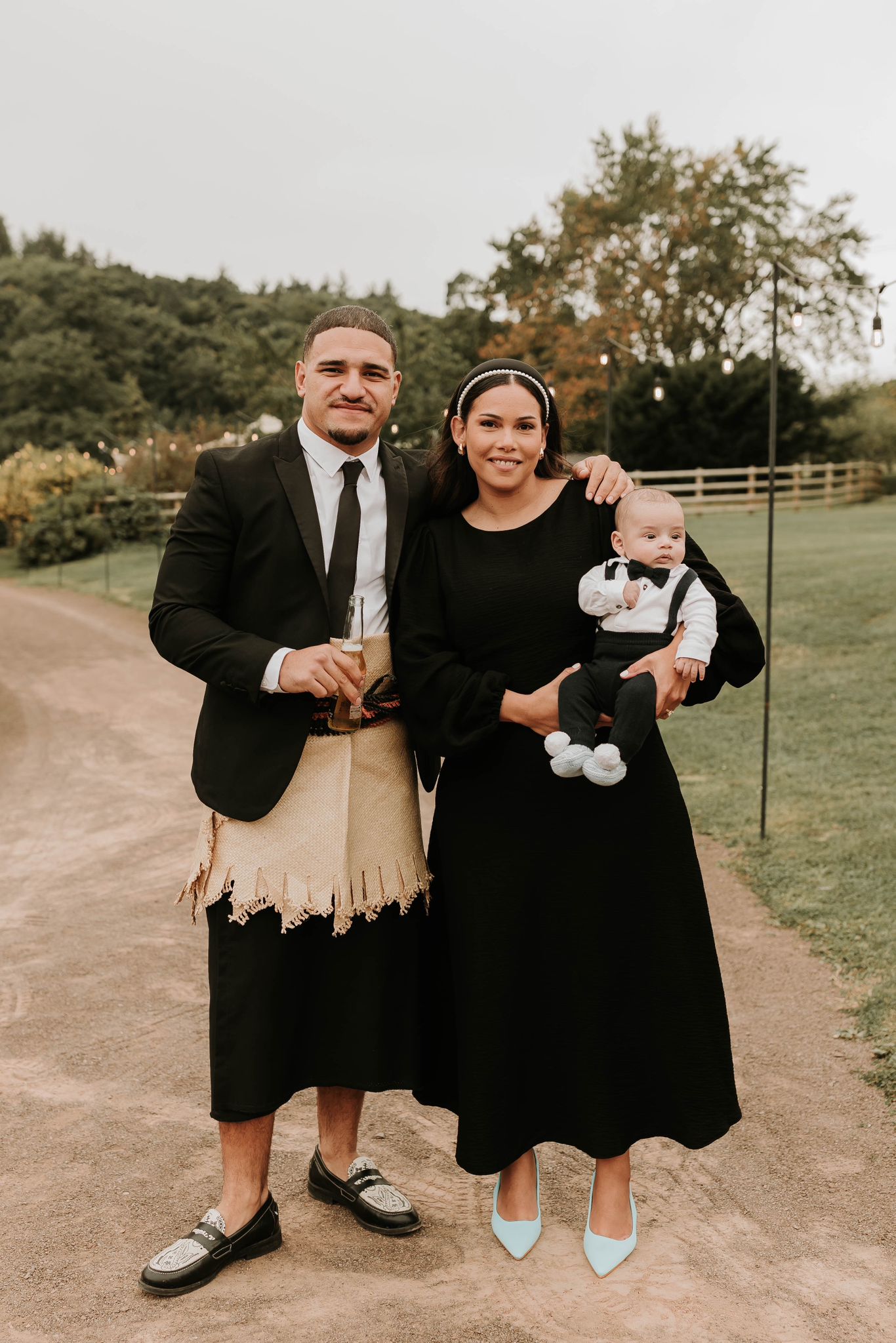 Sione Tuipulotu, Lara Tuipulotu and Fohe Tuipulotu Junior pose for a family photo