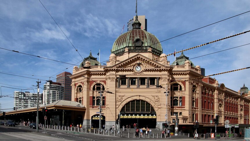 The empty intersection outside Flinders St station in Melbourne.