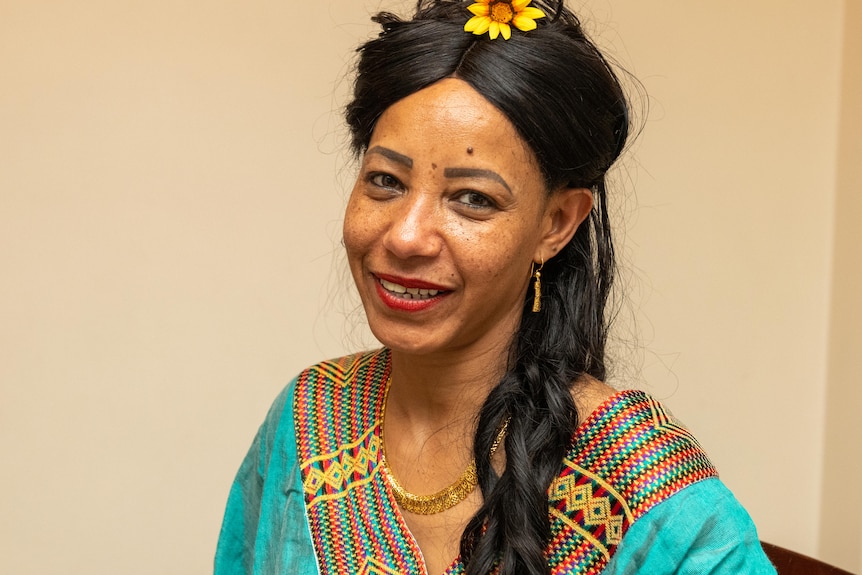 Meseret's sister Mekedes wearing traditional dress.