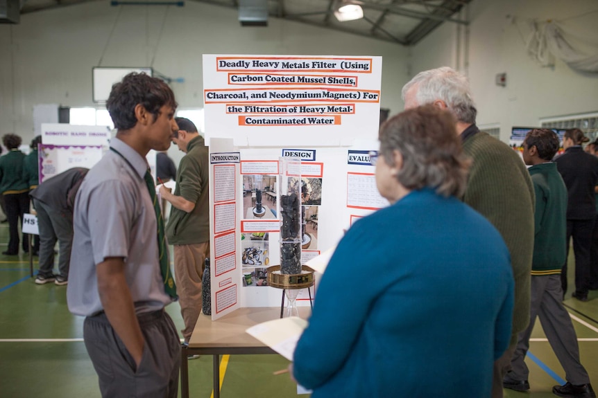 Teenager Uriah Daisy with his science project in Coolgardie, WA.