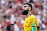 Mile Jedinak looks on after the Socceroos' World Cup loss to Peru.