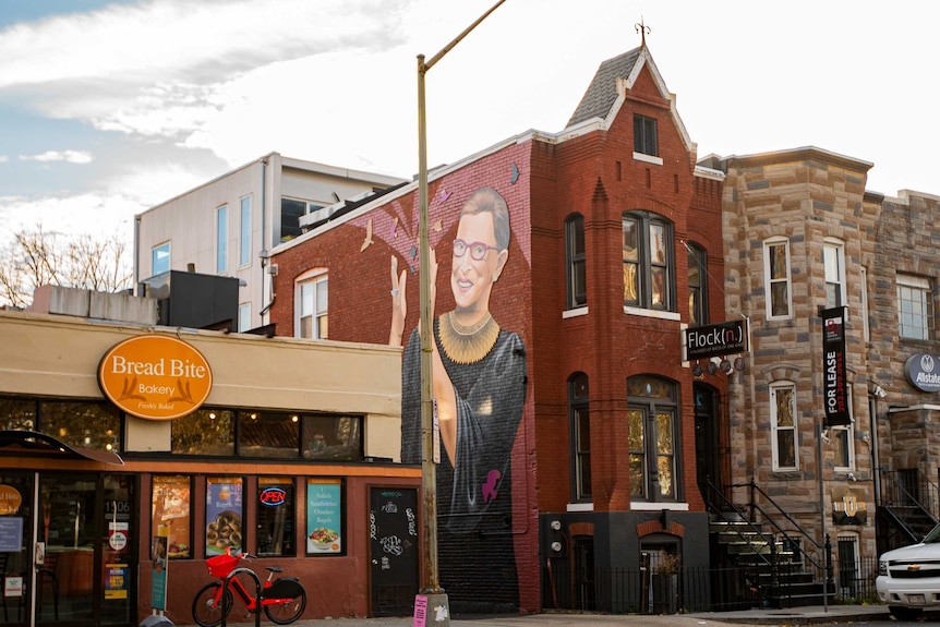 A mural of Ruth Bader Ginsburg on the side of a building in Washington DC