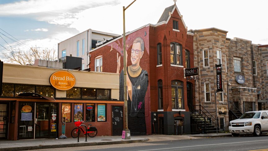 A mural of Ruth Bader Ginsburg on the side of a building in Washington DC