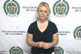 Australian woman Cassie Sainsbury in handcuffs after she was arrested at the international airport in Bogota