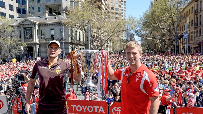 Luke Hodge and Kieren Jack at Grand Final parade