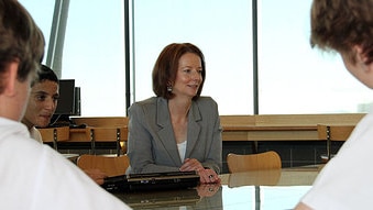 Deputy Prime Minister Julia Gillard sits with Rockhampton Grammar School students on May 17, 2010. (ABC News/Alice Roberts)