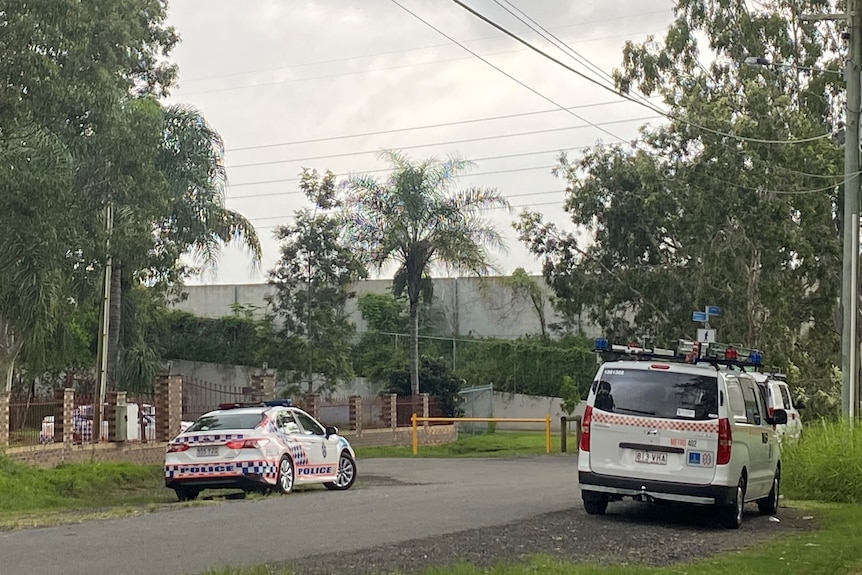 Two police vehicles parked in a street