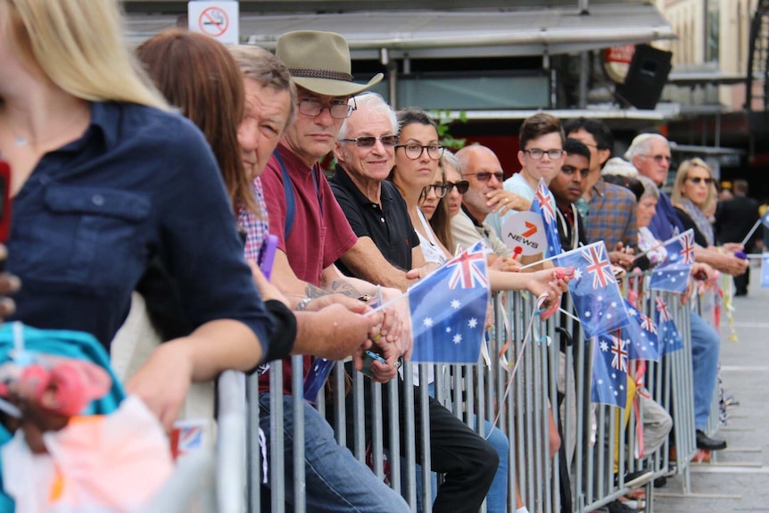 Crowds waited for the Australian Olympic team's arrival in Brisbane.