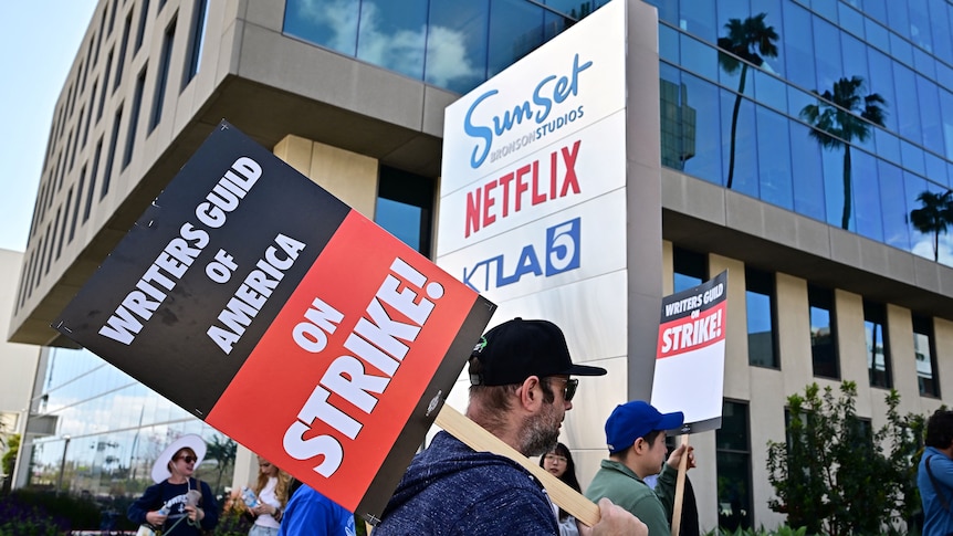 Writers picket in front of Netflix on Sunset Boulevard in Hollywood