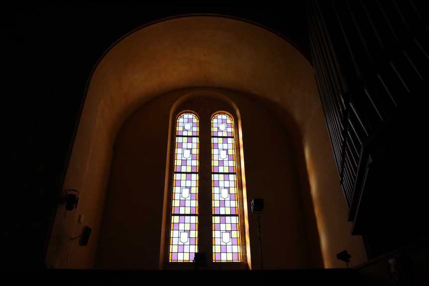 Stained glass windows from the inside of Winthrop Hall.