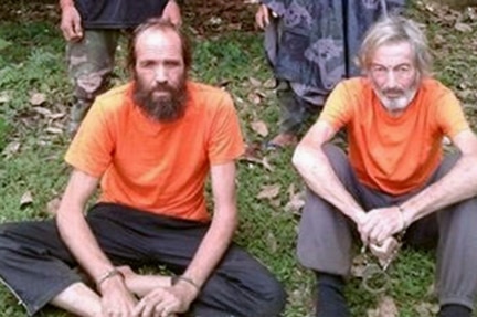 Hostages Norwegian national Kjartan Sekkingstad (L) and Canadian national Robert Hall (R) in an undated picture released to local media