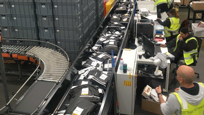 Staff ship out packages from The Iconic's Sydney warehouse.