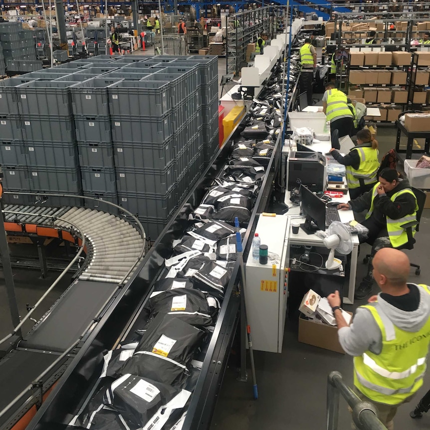 Staff ship out packages from The Iconic's Sydney warehouse.