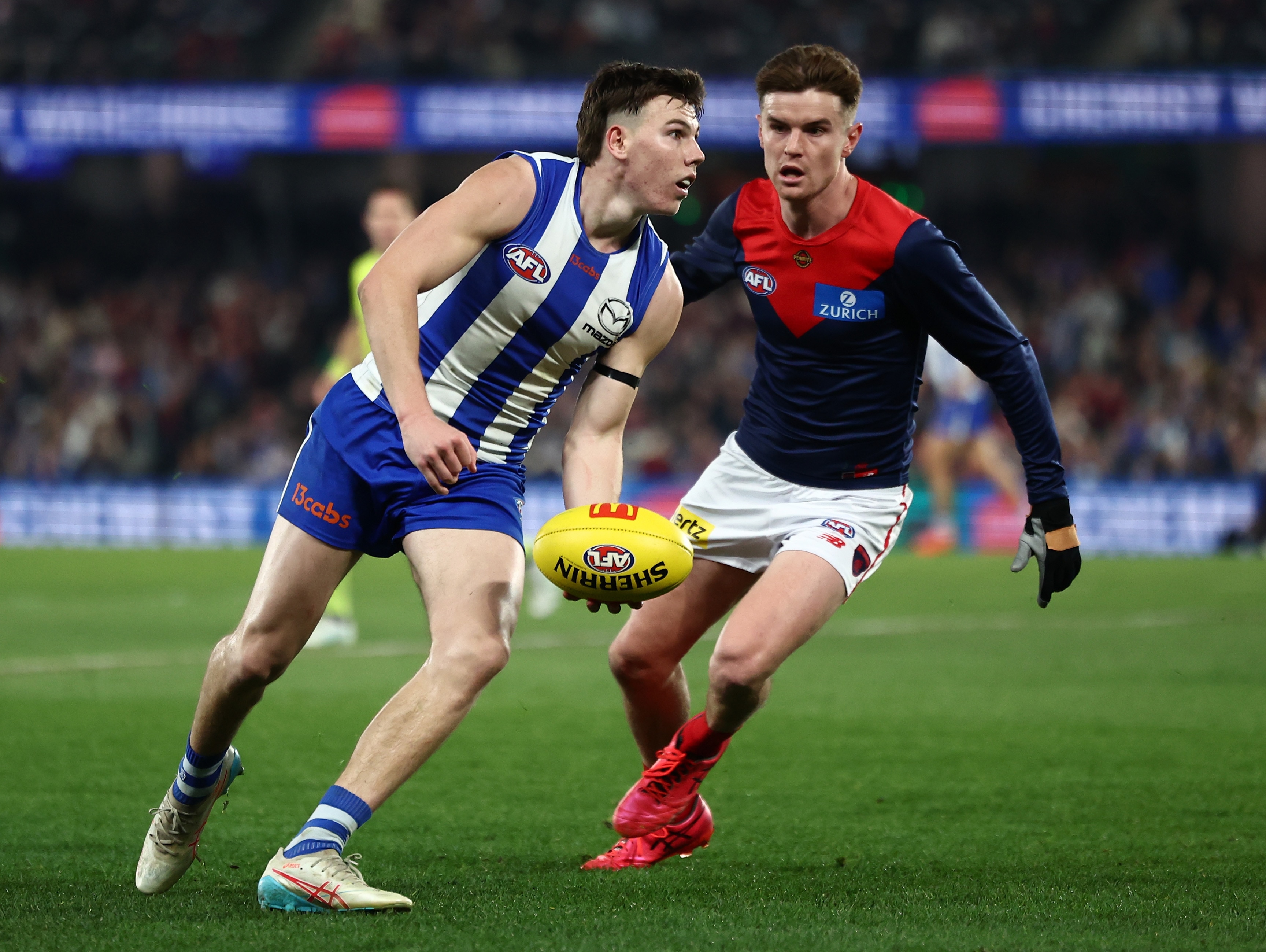 Live: Roos and Dees locked in thriller as stray boot leaves star bloodied
