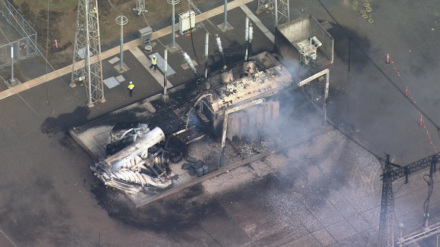 Destroyed transformer photo taken from above, still smoking.