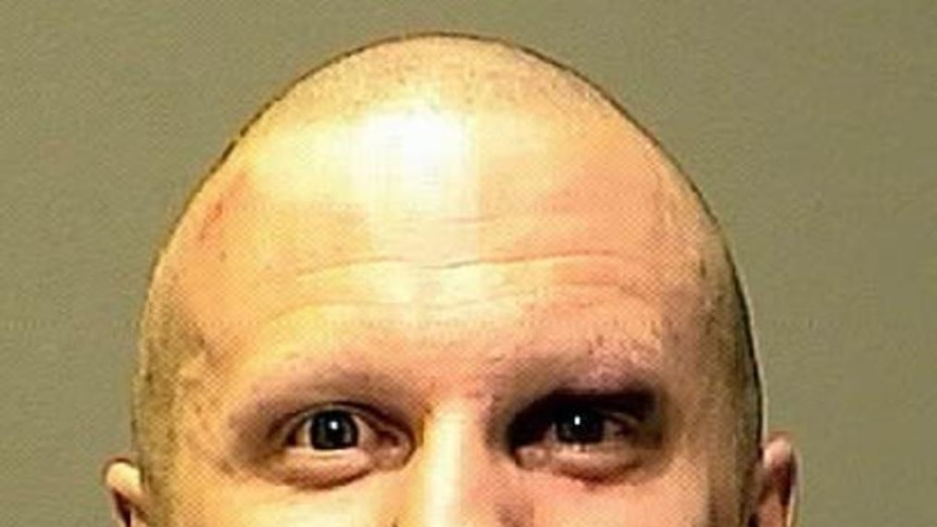 Loughner showed little reaction as the multiple murder charges were read to him.