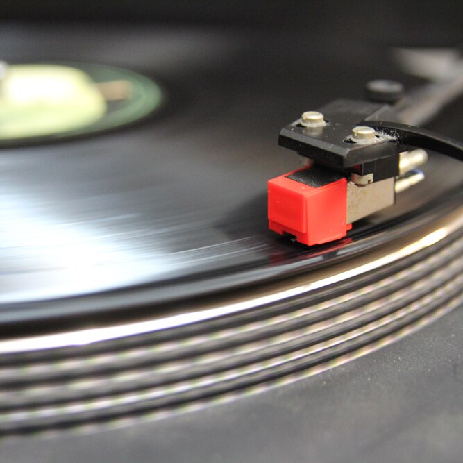 Close up of a needle on a vinyl record