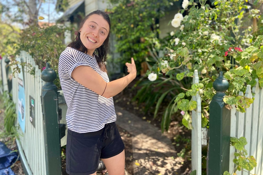 Amelia out the front of her Melbourne home.