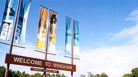 Flags and a 'welcome to Wingham' sign