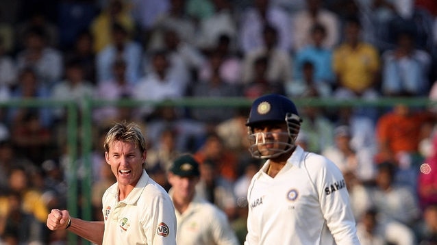 Brett Lee celebrates the wicket of Virender Sehwag