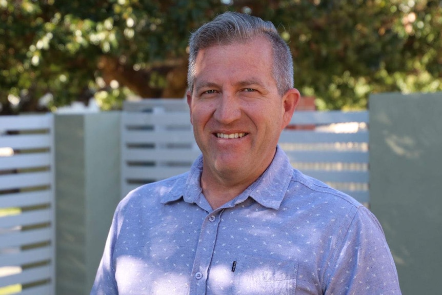 A close up of Paul Clements in his front yard.