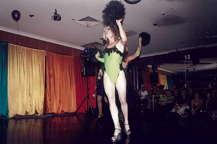 A drag queen performing on the Throb stage on opening night.