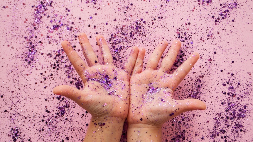 glitter on childs hands