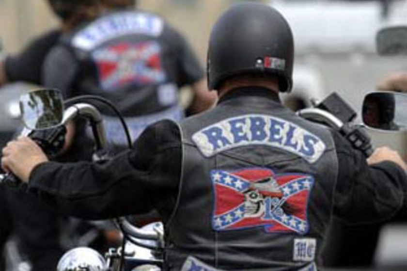 A member of the Rebels Motorcycle gang has been charged with fraud